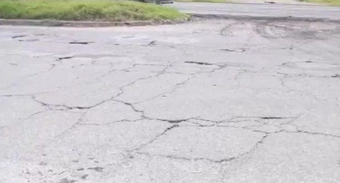 Alligator cracking and failed trench repairs